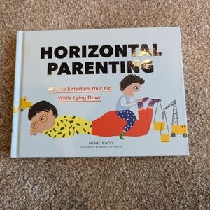 Horizontal Parenting Hardcover Book by Michelle Woo Entertain Your Kid Lying Dow